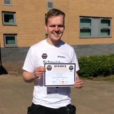 Electrical apprentice Tom Tyler with his certificante for winning the regional finals of the SPARKS magazine Learner of the Year competition