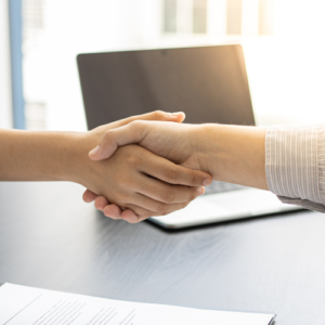 Two people shaking hands