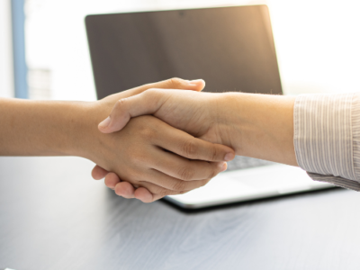 Two people shaking hands