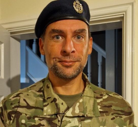 Former GCSE maths student Robin Tinsley wearing camouflage gear and an RAF beret