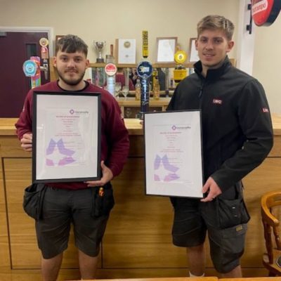 Aaron and Brad Santos with their certificates