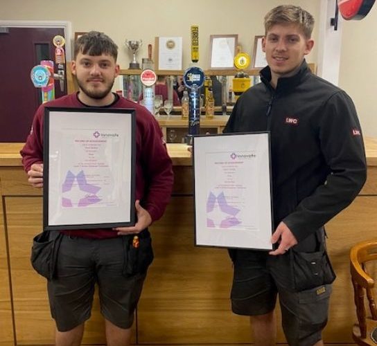 Aaron and Brad Santos with their certificates