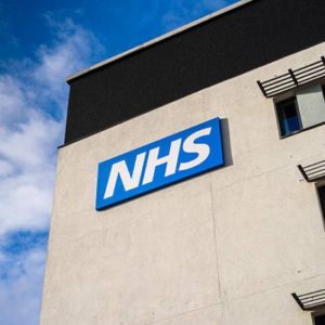 NHS logo - white lettering on a blue background